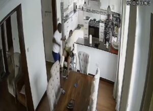 Uproar as CCTV Captures Nigerian man Brutally Beating up a Disabled Woman in an office at Nairobi